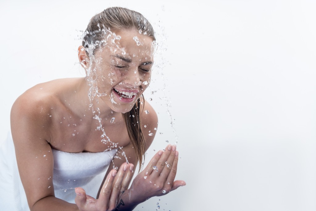 Girl Washing Her Eye